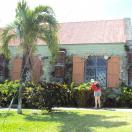 Tourists taking pictures of a church in Antigua