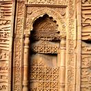 Carving detail from a screen at the mosque  Photo - Delhi, India 