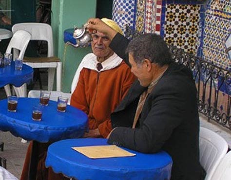 Four Travelers Perform Foodie Feats Photo